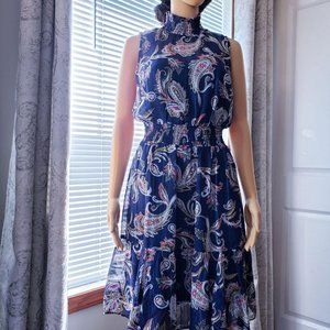 SLEEVELESS SMOCKED MOCK NECK DRESS